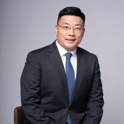 Portrait of Yang Wang, Vice President of TIGA Financial